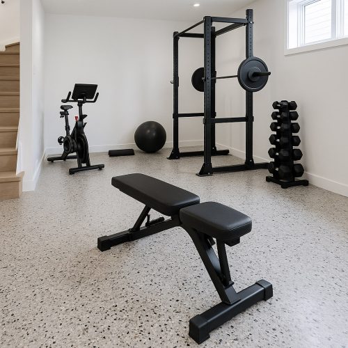 salle-de-sport-moderne-et-spacieuse alt="Finition avec effet terrazzo signée Béton Surface"